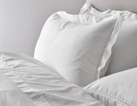 Close Up of Hotel Pillows On a Bed | scooms