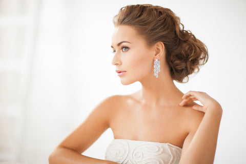 bride with romantic dazzling earrings