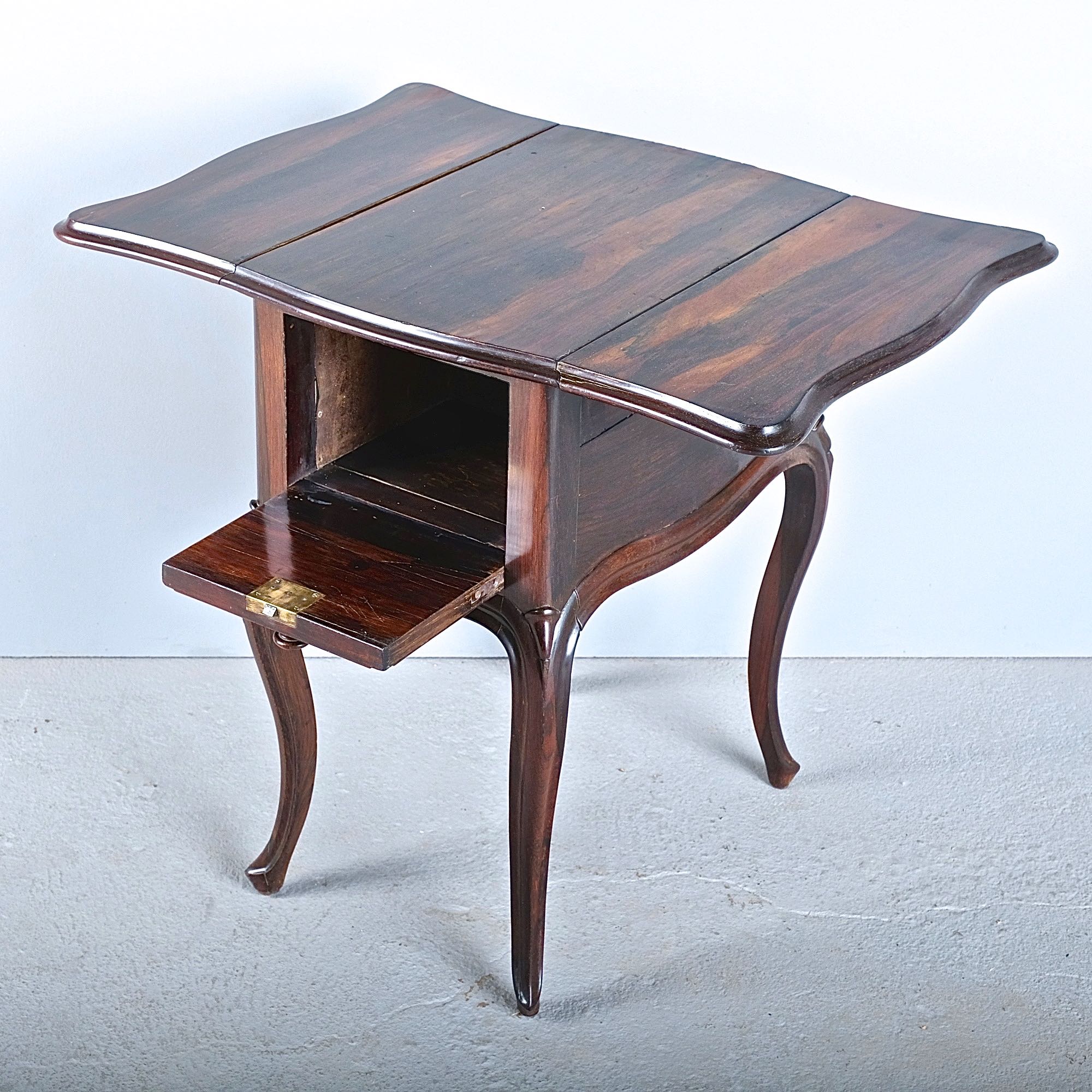 Antique twodrawer drop leaf accent table with cabriole legs, rosewood