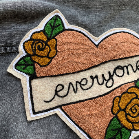 chainstitch embroidery heart with roses patch on denim jacket