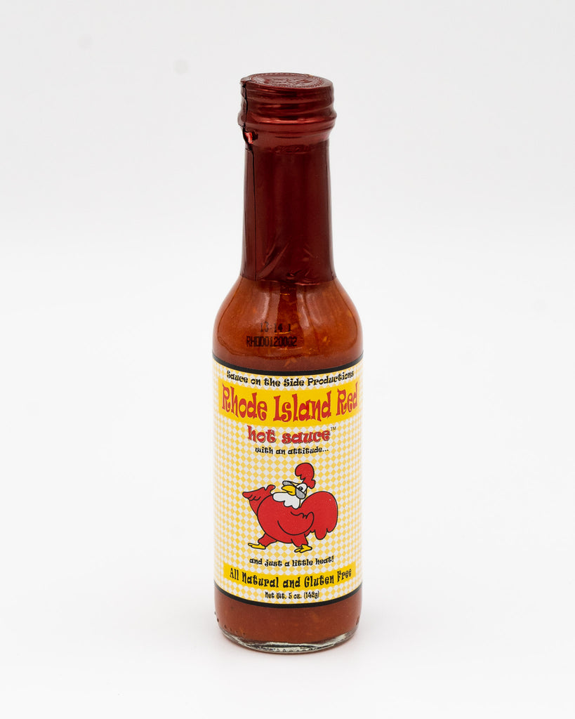A fabulous sauce that will enhance, not overpower, your food.  Made with peppers, tomatoes, carrots, vinegar, mustard, salt, sugar, and love.  Rhode Island Red has been described as addictive by hot sauce aficionados.  It’s the perfect combination of peppers and other fresh vegetables that gives RI Red Hot it's distinctive “sweet heat.”  5 oz. bottle - Case of 12
