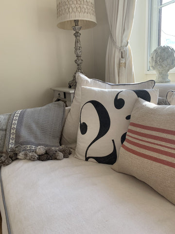 https://theinteriorco.co.uk/collections/soft-furnishings/products/grey-throw-rabbit-pompom