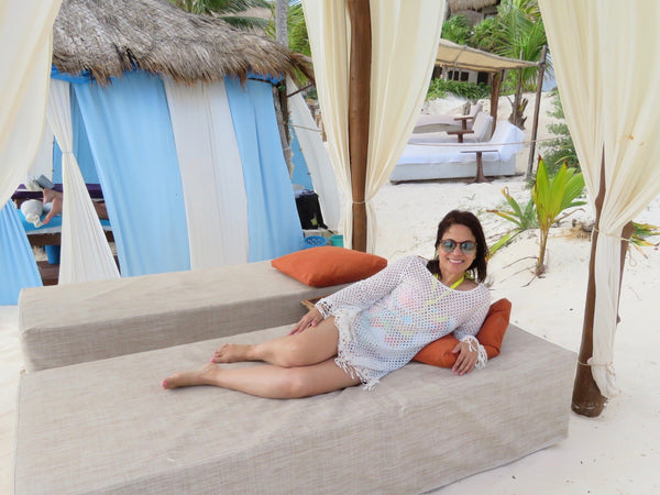 Amita on the white beach of Tulum at Arenablue.