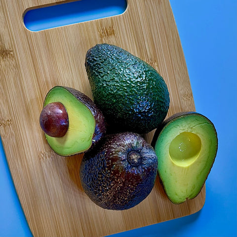 Avocados on cutting board