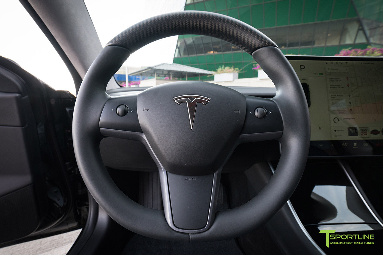 tesla-model-3-space-x-blue-custom-leather-interior-carbon-fiber-steering-wheel-1_94a34e81-0154-44c7-93f2-62124ca2e2e5.jpg