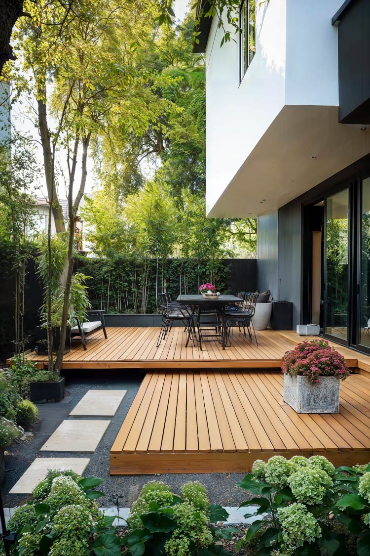 modern patio deck in landscaped yard