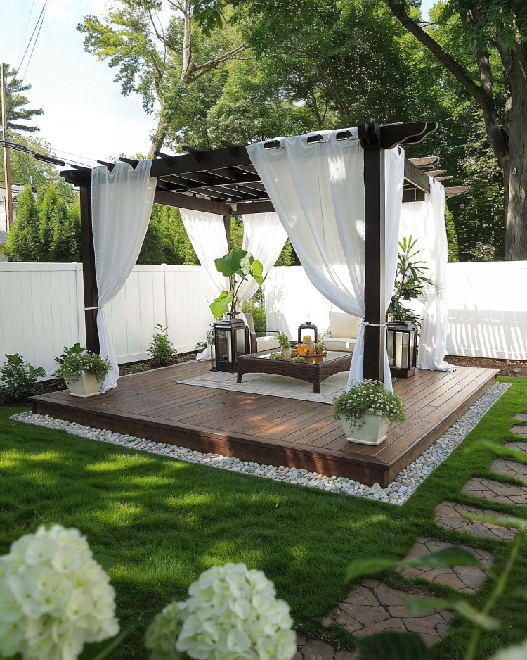ground deck idea with pergola and white cloth design in beautiful yard
