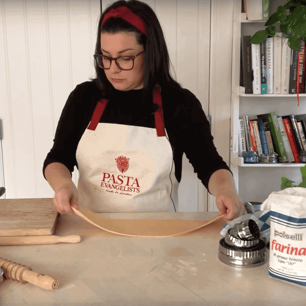 Pasta Evangelists how to make tagliatelle - step 7 transfer sfoglia to cutting board