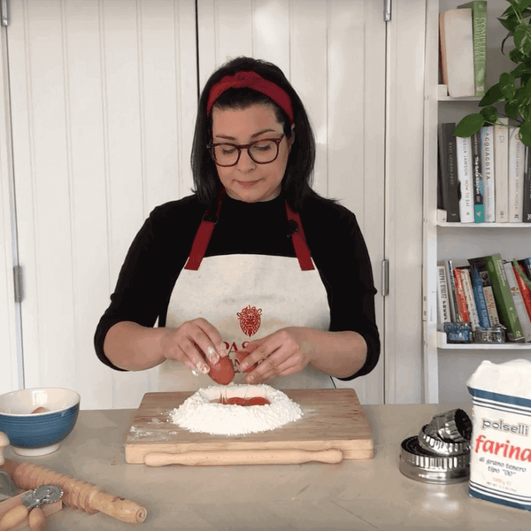 Pasta Evangelists how to make fresh pasta - step 2 add eggs to well in flour