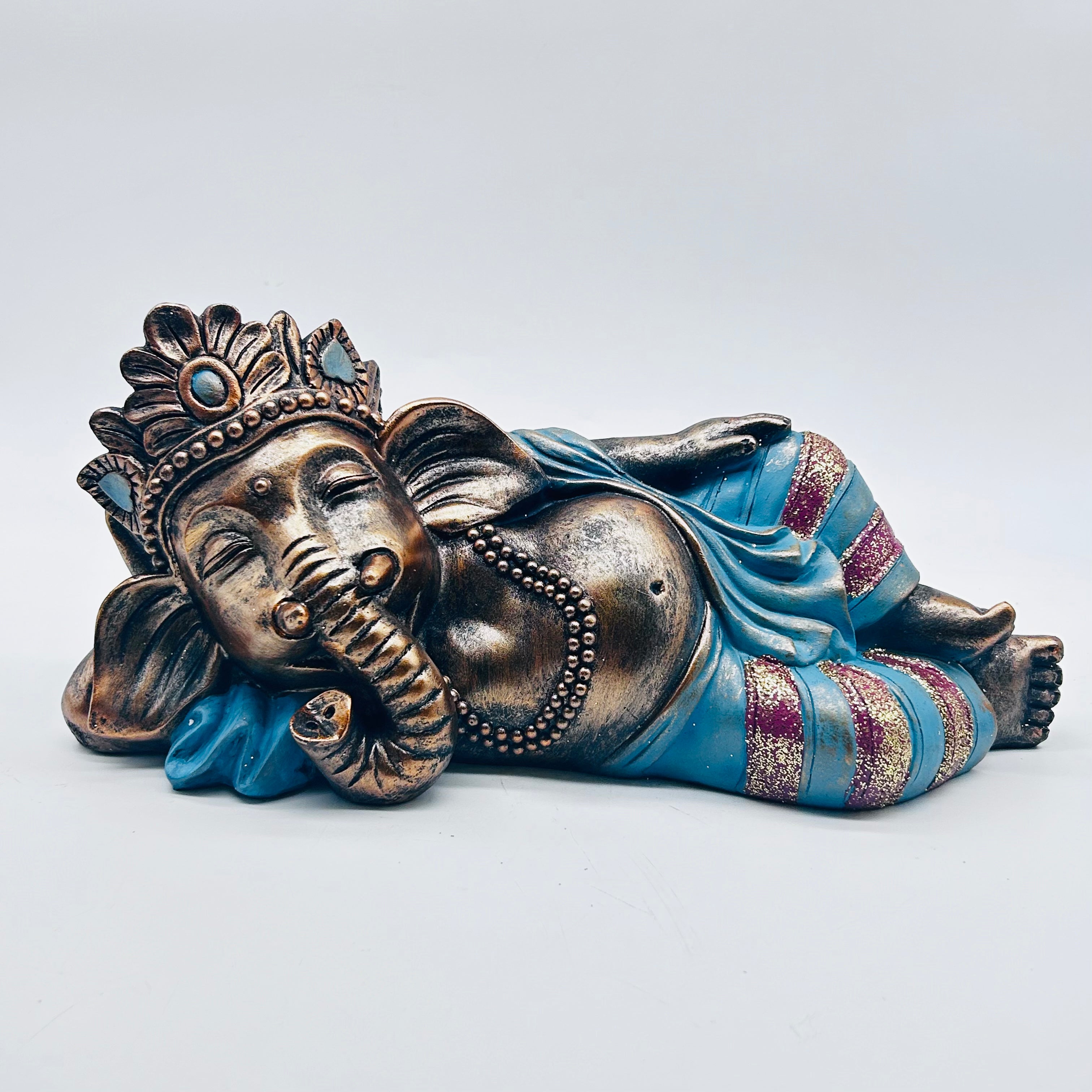 Ganesha Lying Down Blue and Bronze Statue
