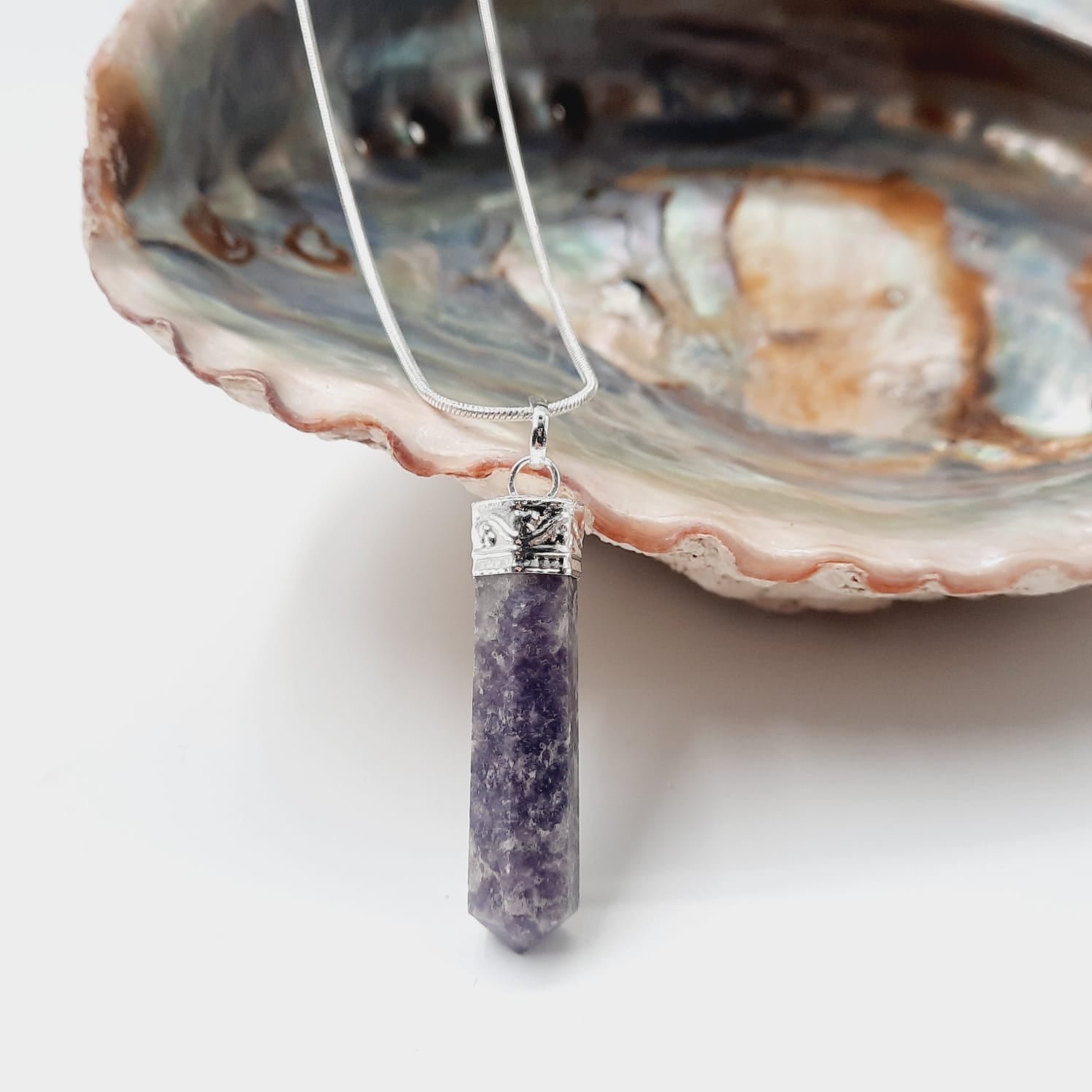 The Happy Stone Lepidolite Crystal Pendant from India