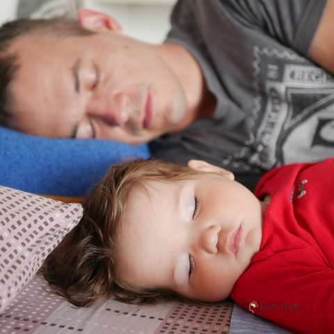 baby and dad sleeping