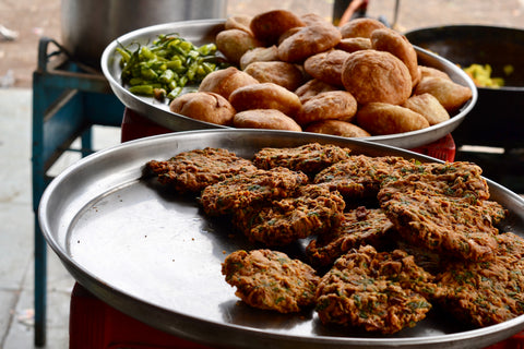 Street food of Ujjain - Kachori (back) and Dal Vada (front)