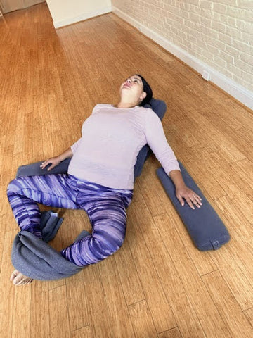 Restorative yoga prop setup for savasana (for pregnant folks