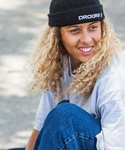 Skater_with_long_hair_wears_beanie