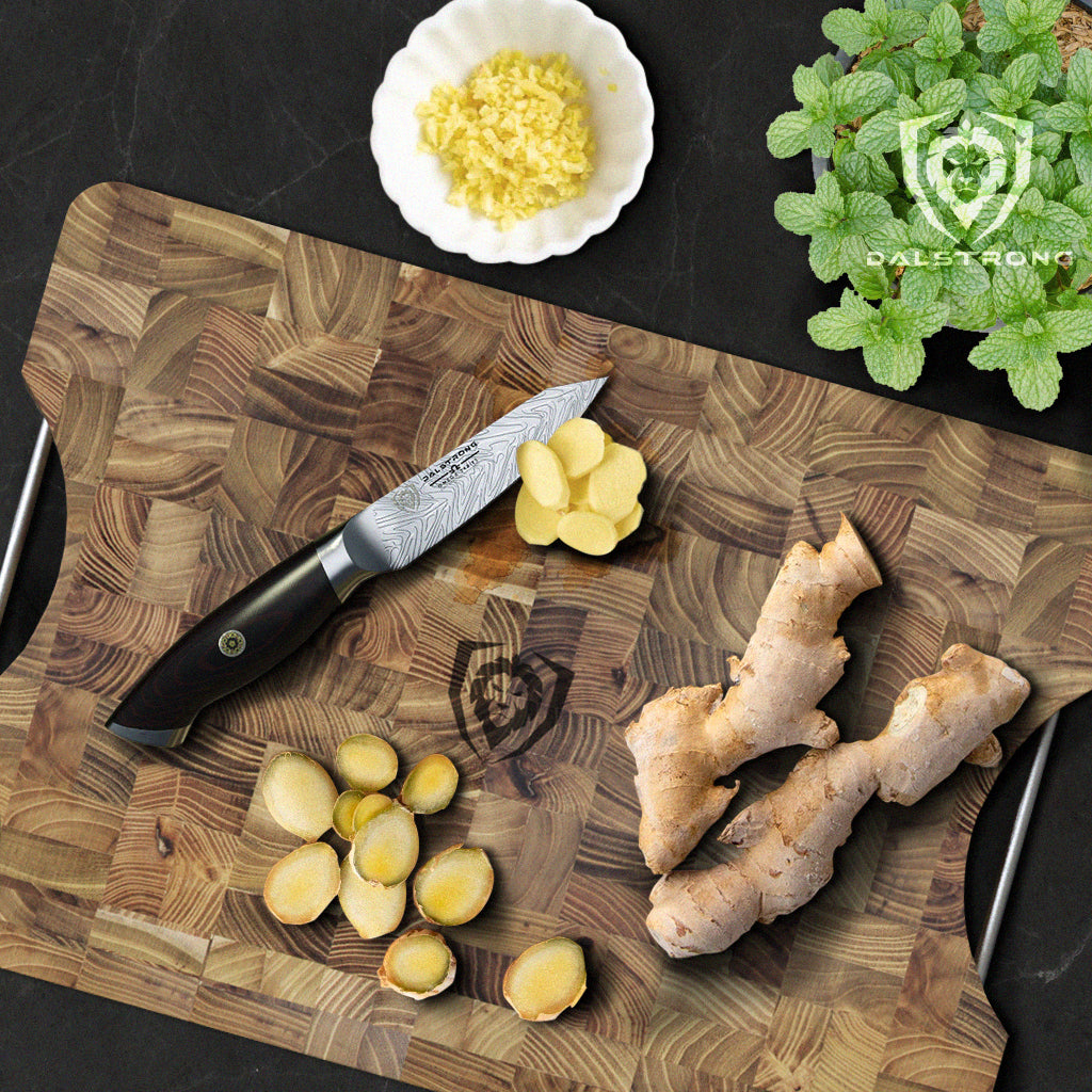 ginger root on cutting board with paring knife