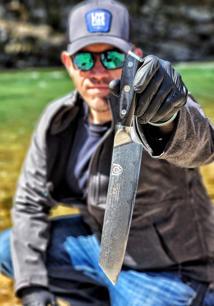 David Olson of Live Fire Republic holding a Dalstrong knife