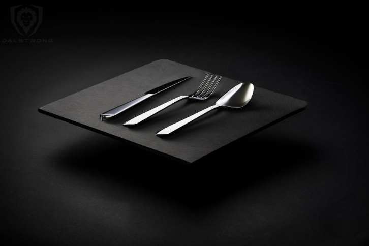 A photo of the 20-Piece Flatware Cutlery Set Service for 4 Stainless Steel Dalstrong in a floating black board.