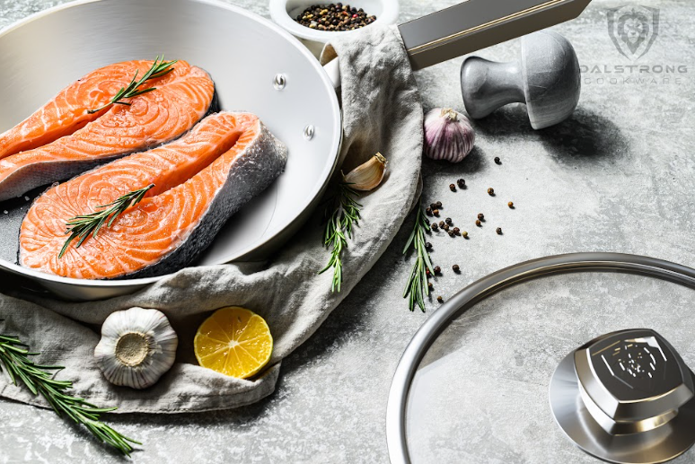 Two fillets of salmon inside of the 9" Frying Pan & Skillet | Silver | Oberon Series | Dalstrong