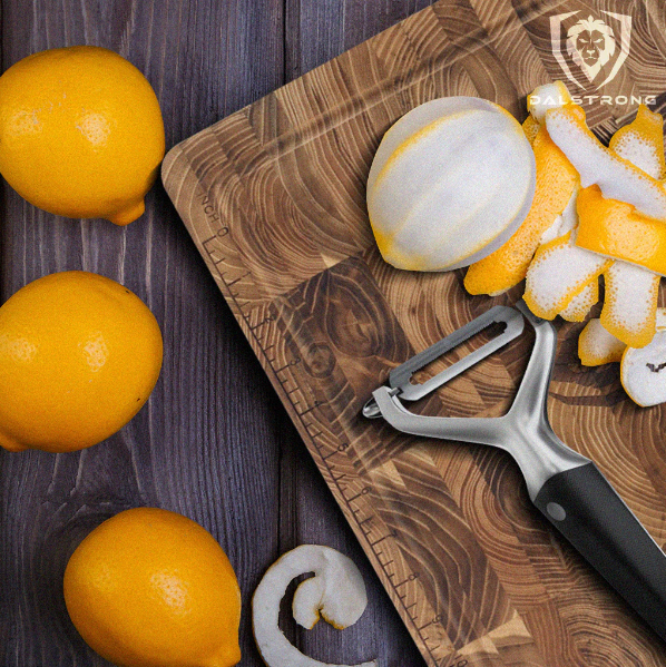 Y Peeler | 3 Blades Case | Dalstrong with a peeled lemon.