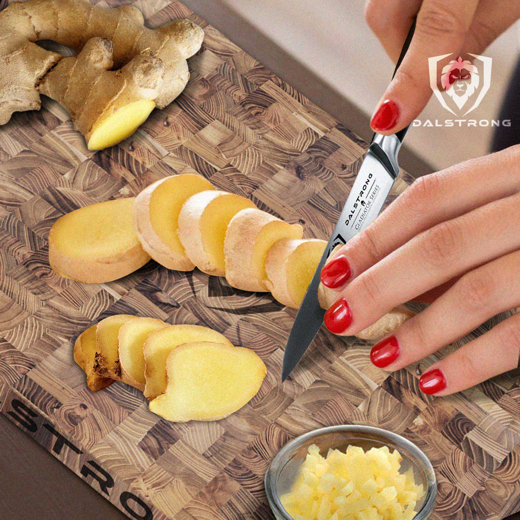 cutting ginger root on teak cutting board