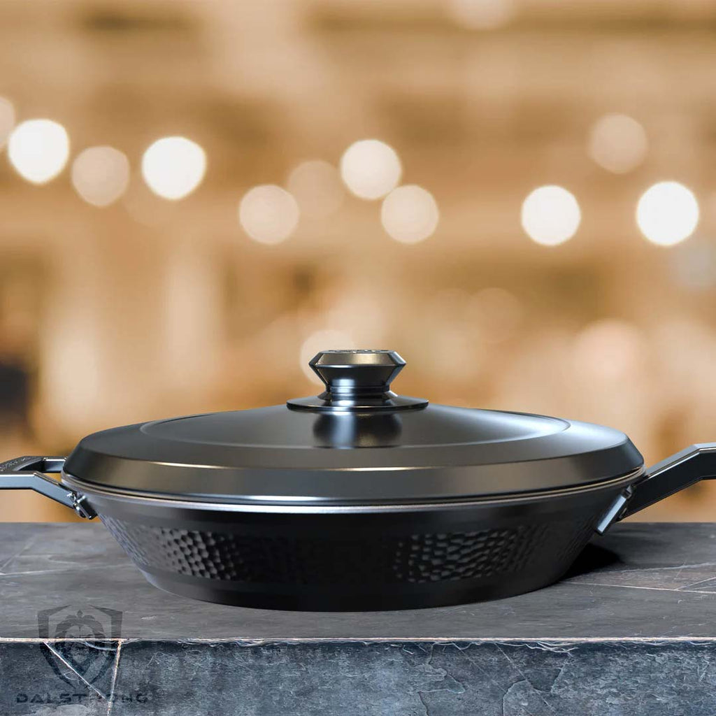 12" Frying Pan & Skillet | Hammered Finish Black | Avalon Series | Dalstrong on a solid surface.