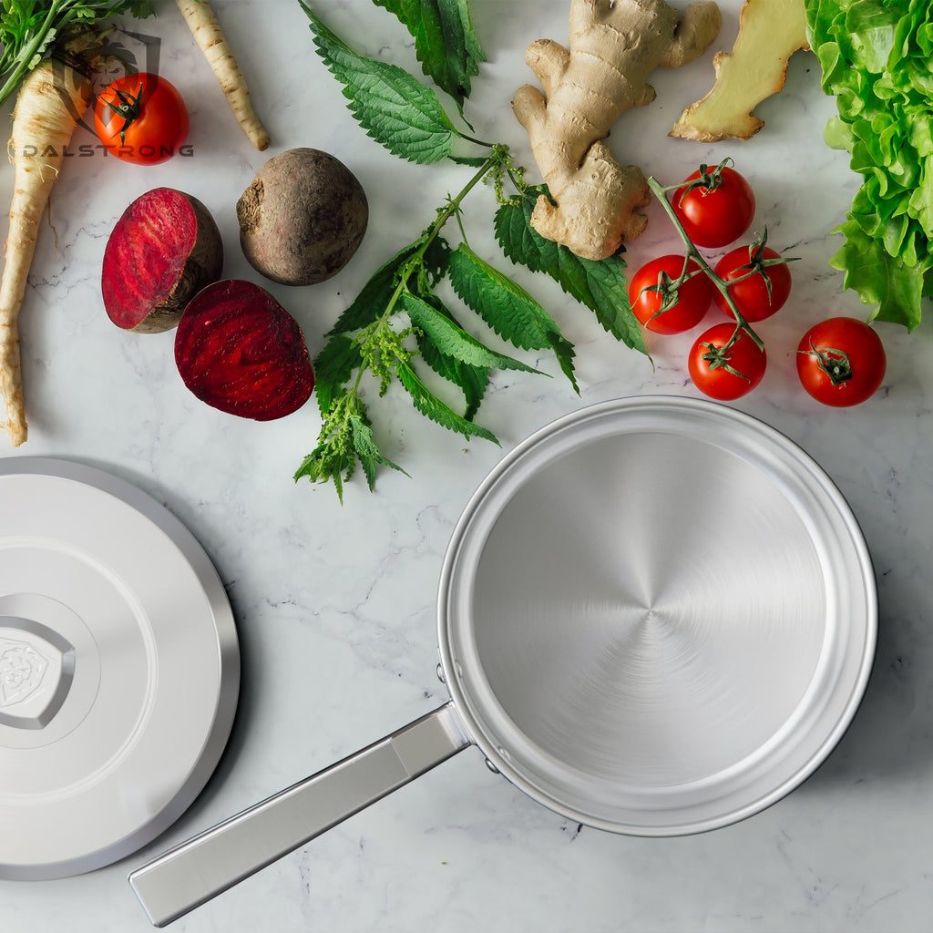 stainless steel surrounded by veggies