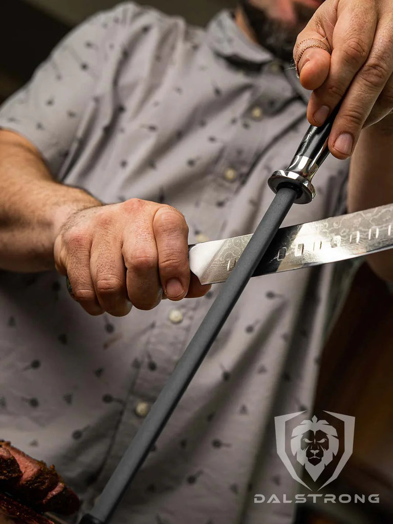 A man honing a knife using the Ceramic Coating Honing Rod 10"