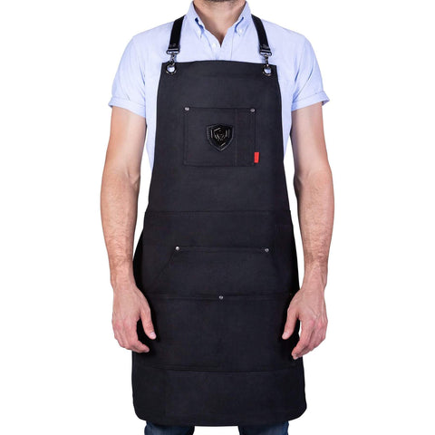 Man posing in Dalstrong Professional Chef's Kitchen Apron - Sous Team 6" with white background