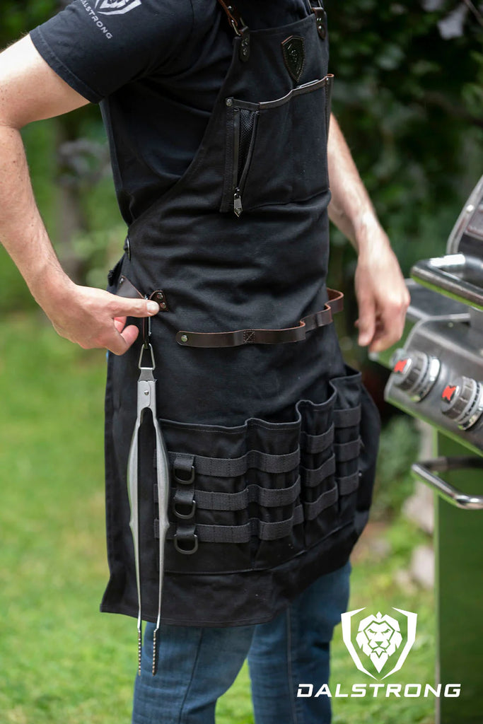 A man wearing the Heavy-Duty Waxed Canvas BBQ Apron