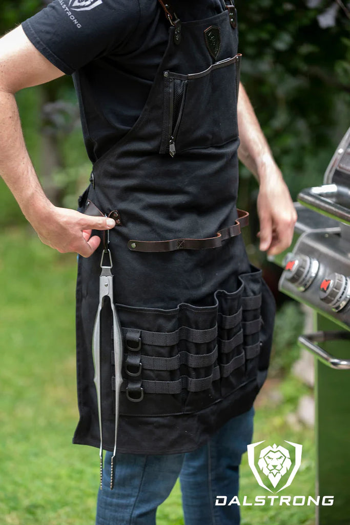 A man wearing the Heavy-Duty Waxed Canvas BBQ Apron.