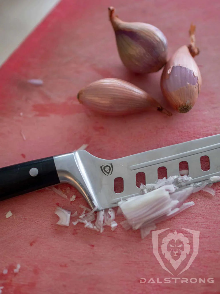 Nakiri Asian Vegetable Knife 6" | Offset Blade | Gladiator Series | NSF Certified | Dalstrong with three onions.