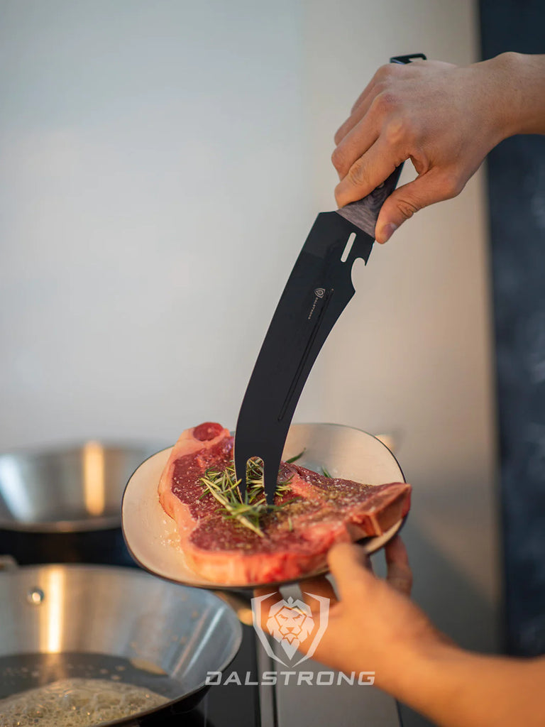 A photo of a hand holding the Pitmaster Knife 9" | Delta Wolf Series | Forked Tip & Bottle Opener | Dalstrong with a steak on the other hand.