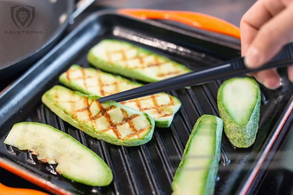 Dalstrong Tweezer used in grilling zuccini