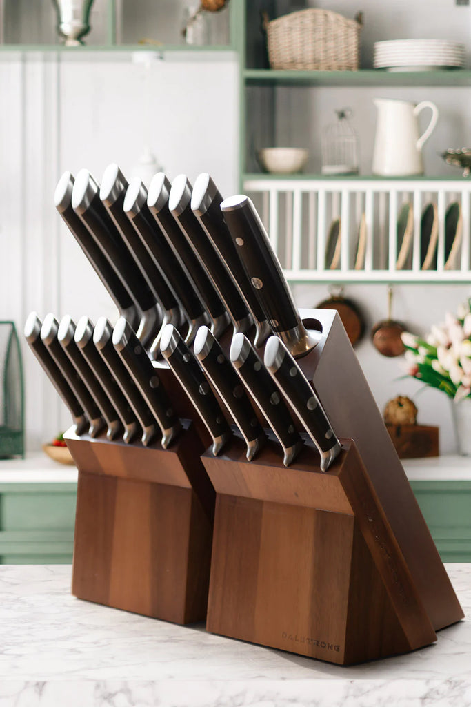 A photo of the 18 Piece Colossal Knife Set with Block | Gladiator Series | Knives NSF Certified on top of a table.