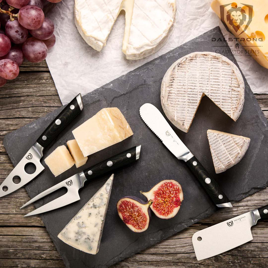 A photo of the 4-Piece Charcuterie & Cheese Knife Set | Gladiator Series | NSF Certified | Dalstrong with different kinds of cheese