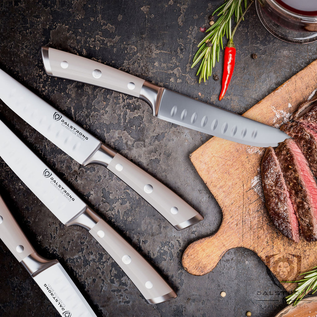 4 piece steak knife set with steak on cutting board