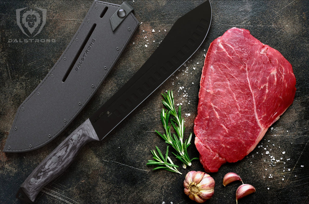 Black bull nose butcher knife beside a large piece of uncooked red meat 