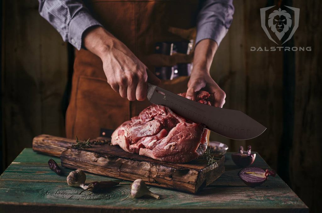 bull nose butcher knife slicing into raw meat