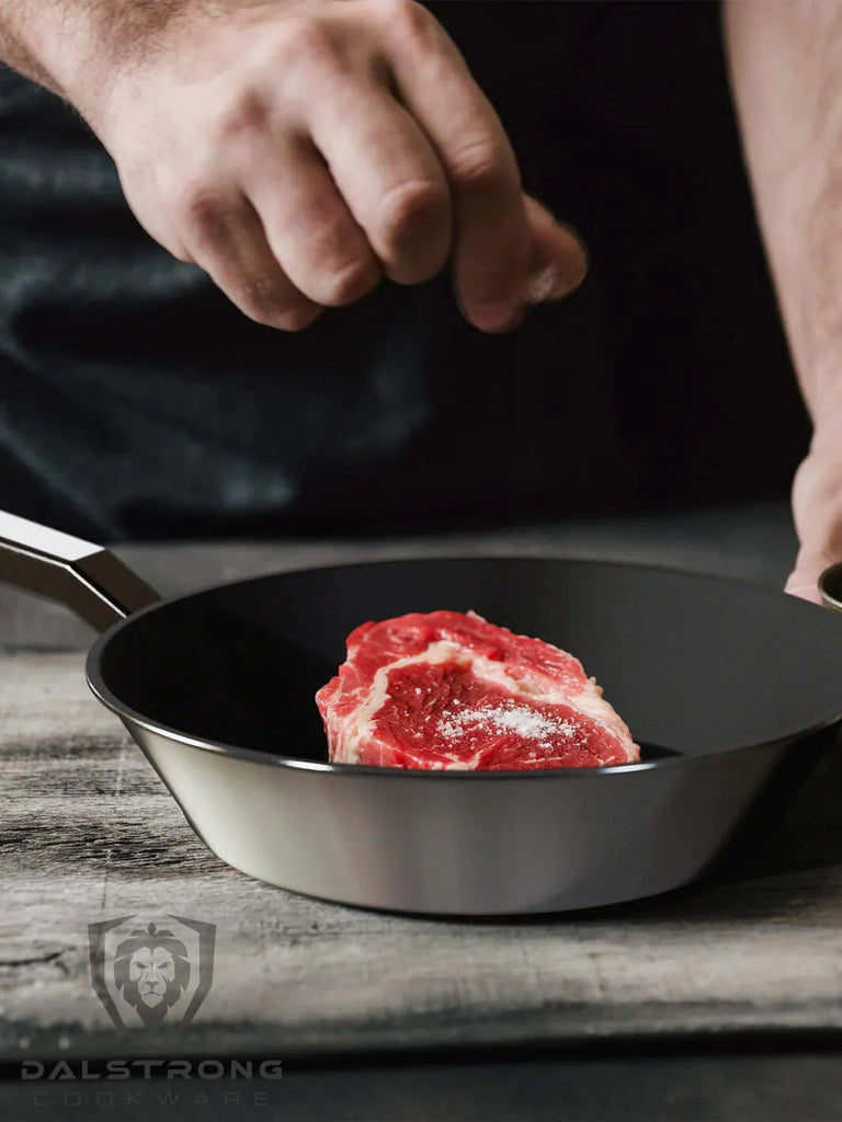 A photo of a steak inside the 10" Frying Pan & Skillet | ETERNA Non-Stick | Oberon Series | Dalstrong