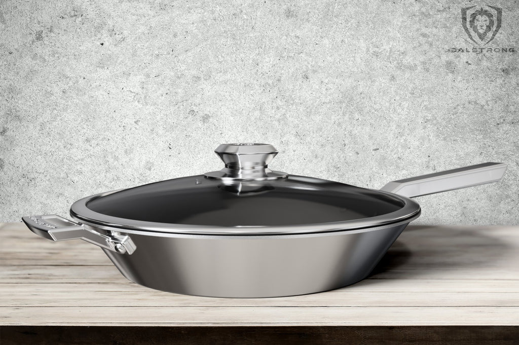 Dalstrong Oberon Series Frying Pan & Skillet on a dark grey granite kitchen countertop