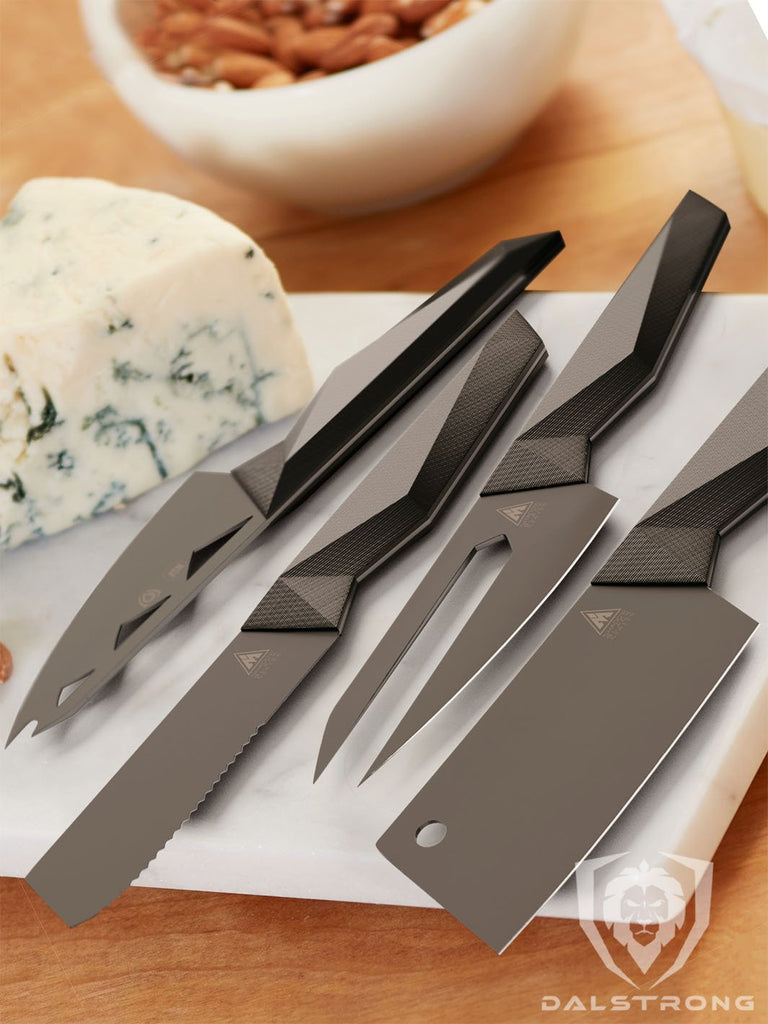 Four black knives for cheese on a white board next to white cheese