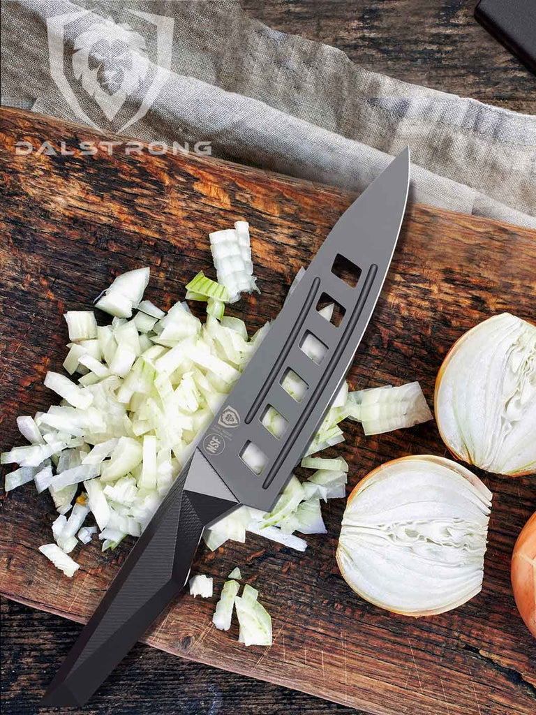 Vegetable Chef's Knife 7" | Shadow Black Series | NSF Certified | Dalstrong with chopped onions on a wooden board.