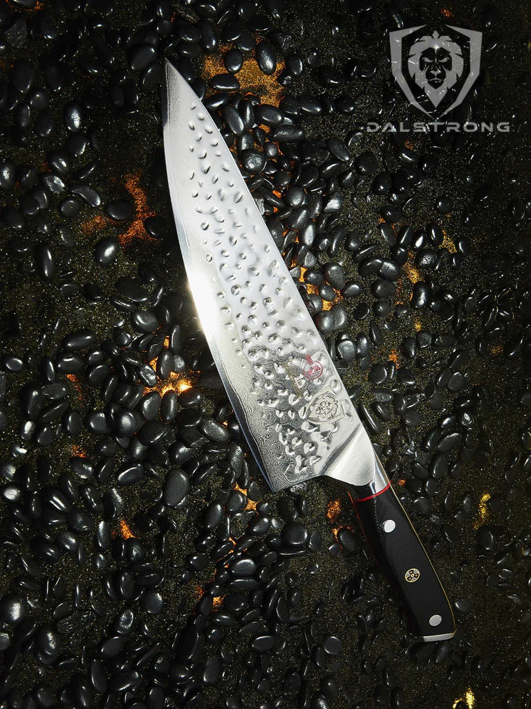 Chef's Knife 8" | Shogun Series ELITE on a burning black sand and pebbles.