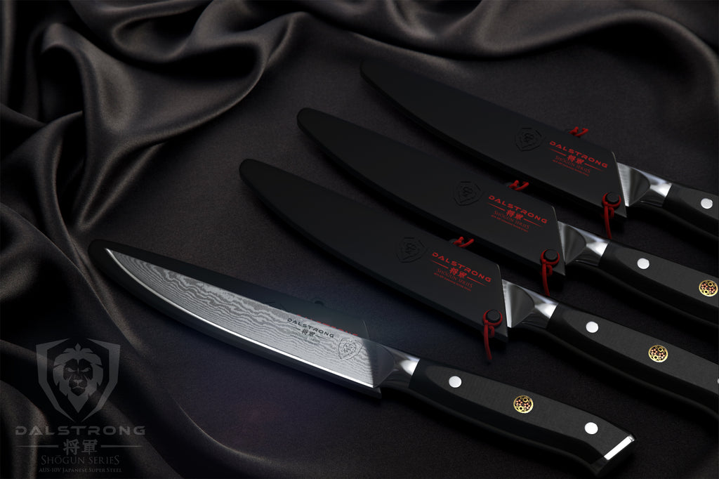 Dalstrong shogun series steak knives on black background