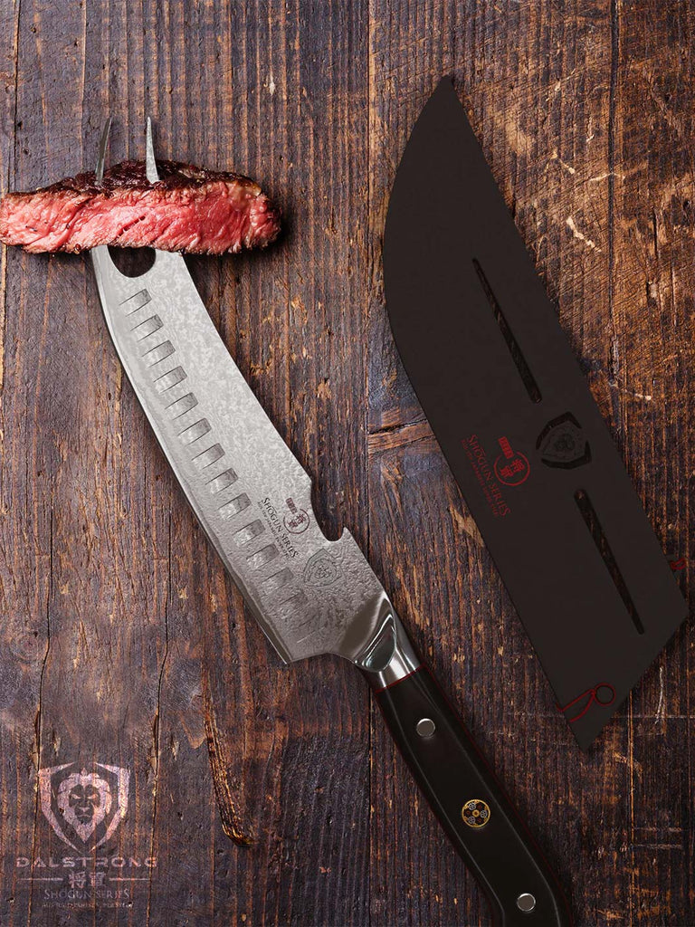 A photo of the BBQ Pitmaster & Meat Knife 8" | Forked Tip & Bottle Opener | Shogun Series ELITE | Dalstrong with a piece of steak on the tip