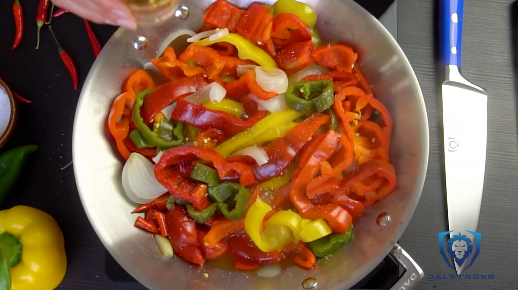 Dalstrong cookware frying up peppers and onions to make homemade hot sauce