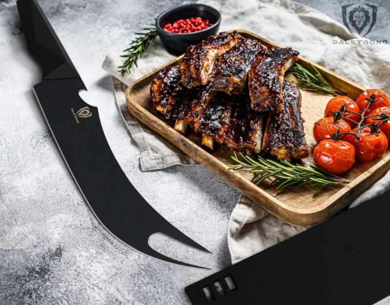 A photo of the BBQ Pitmaster Knife 9” Shadow Black Series Dalstrong beside a beautiful slices of bbq ribs in a tray