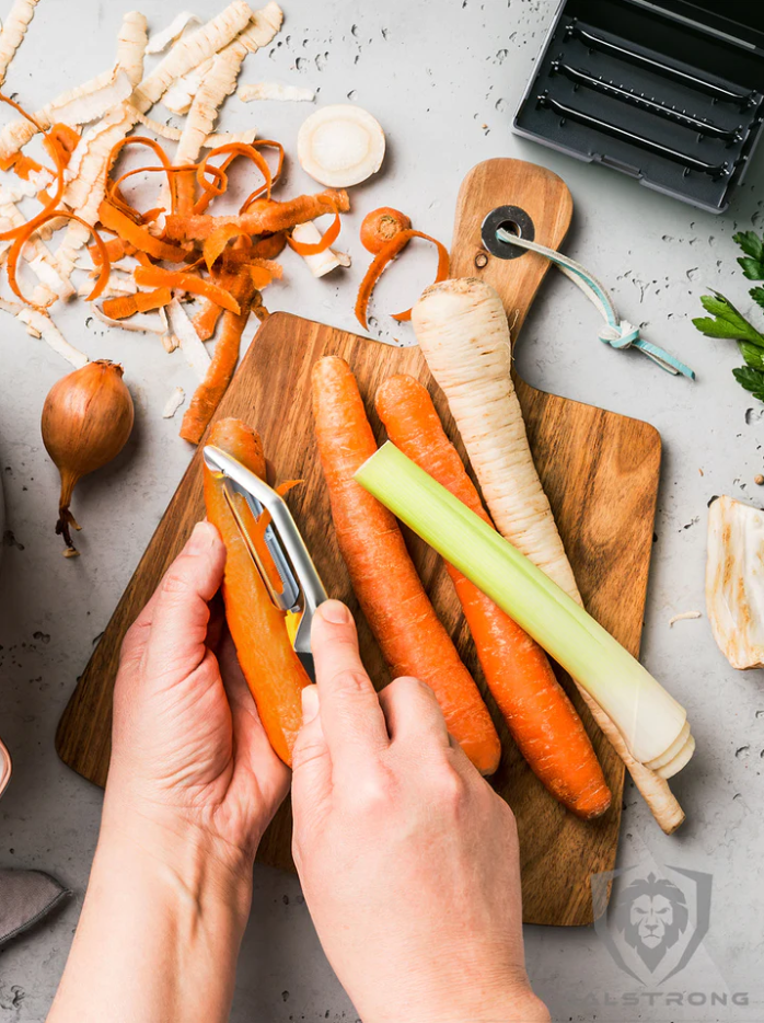 Photo of hand peeling a carrot using the Swivel Straight Peeler 3 Blades Case | Dalstrong