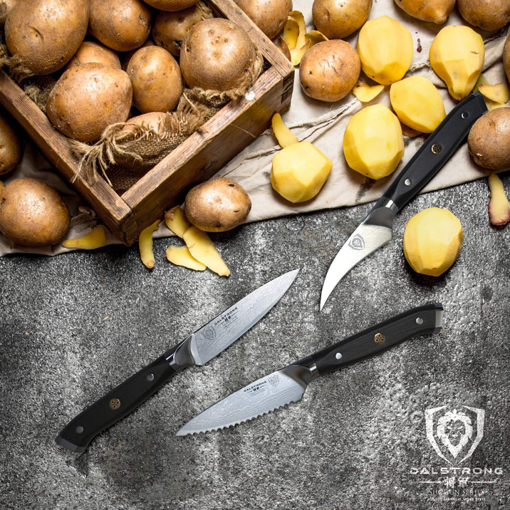A bunch of potatoes inside a wooden box and six perfectly peeled using the 3 Piece Paring Knife Set Shogun Series Elite | Dalstrong 